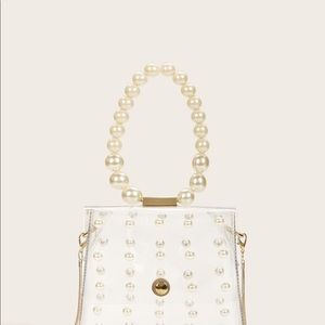 Clear pearl purse  never used still in plastic